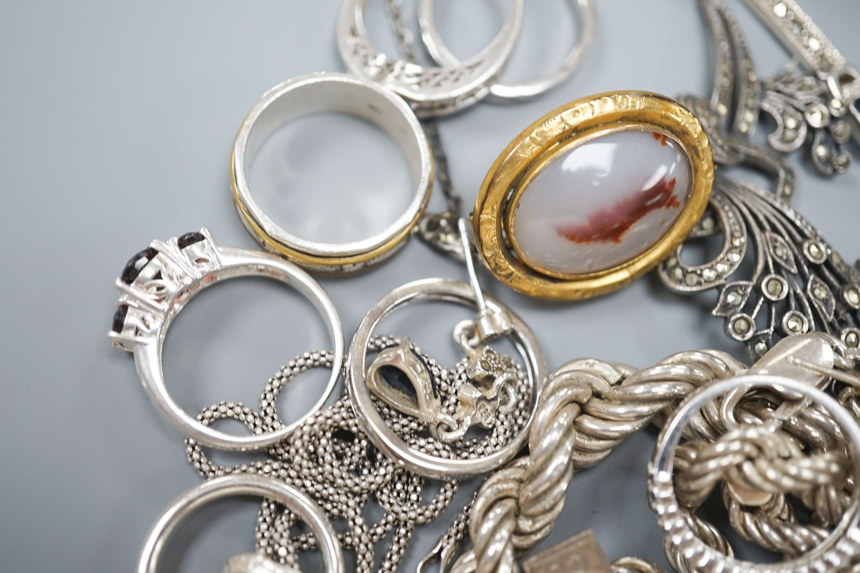 Mixed jewellery including silver and costume, together with a silver toastrack, a silver sovereign case, etc.